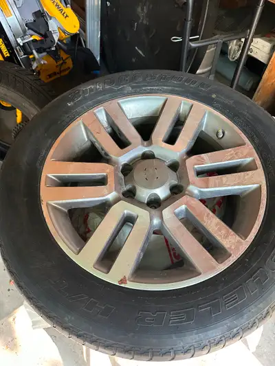 Bridgestone Dueler all season tires. In fair condition. Originally on Toyota 4Runner
