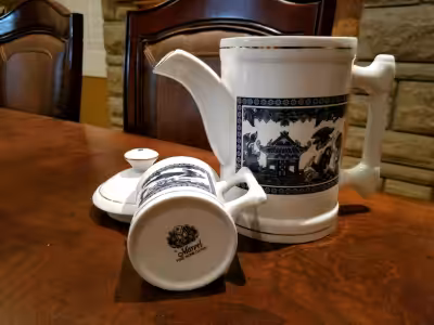 Lightly Used Marvel Fine Bone China Tea Pot Set in a elegant blue and white color. No chips or crack...