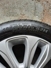 4 - 185/55 R15 all season tires on OEM alloy rims