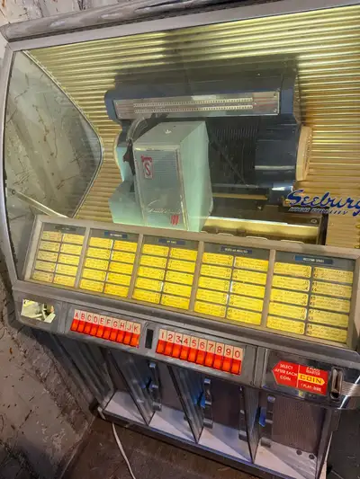 Seeburg hf100r jukebox lights up can’t get it to play record 4000 obo