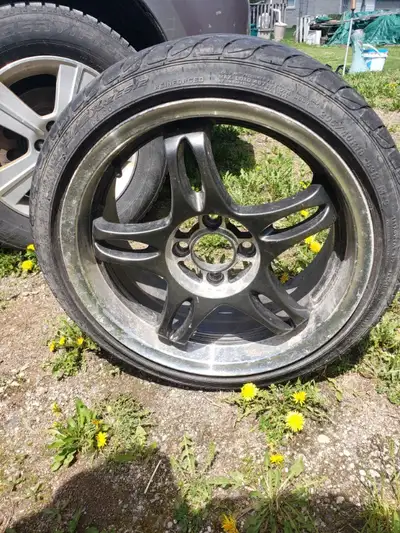 205/40 R16 4 wheels and decent tires NOT SURE WHAT RIMS FIT 150$