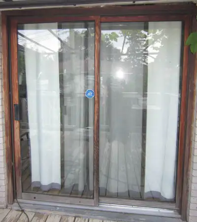 Wooden sliding patio doors (2 pcs) (72-1/2" x 82-3/4"), View more