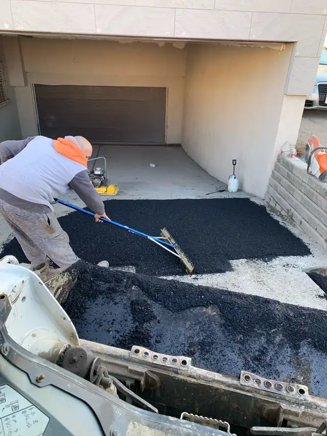 Parking lot pothole repair63235338187905124