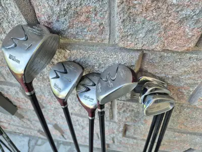 For sale is a set of used Wilson Deep Red Distance golf clubs, perfect for golfers looking for relia...
