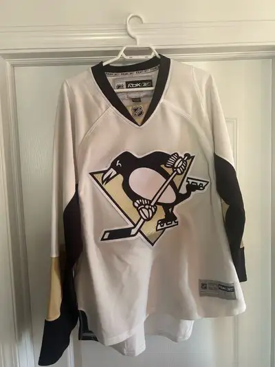 Pittsburgh Penguins authentic Reebok jersey. Size is men’s large. No visible signs of undone stitchi...