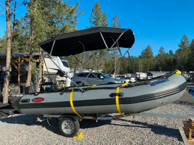 Super steady family fun or serious fishing boat. 2021 Seamax 14 Foot inflatable, 2021 Suzuki 20 HP 4...