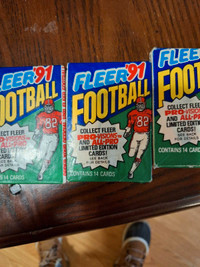 Baseball one package, 7 packages of football cards.