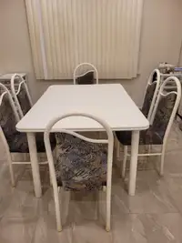 DISCOUNTED-Used white dining table with 6 upholstered chair