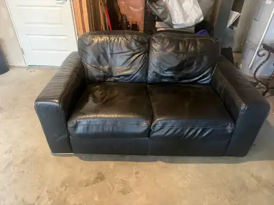Black leather loveseat , View more