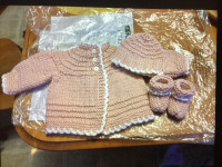 Handmade knitted baby layettes (sweater, hat, booties, blankets,