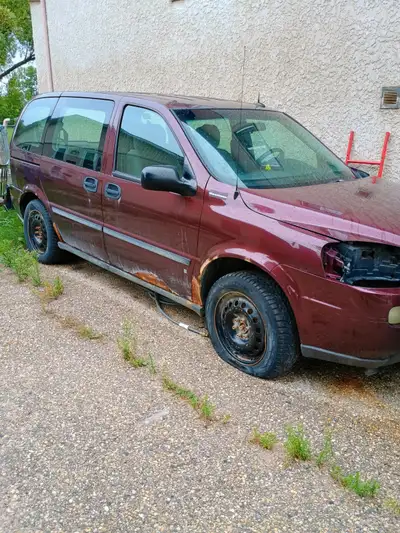 I tried to be a mechanic.. I SUCK AT THAT. so am offering this fixable or parts monkey. The van does...