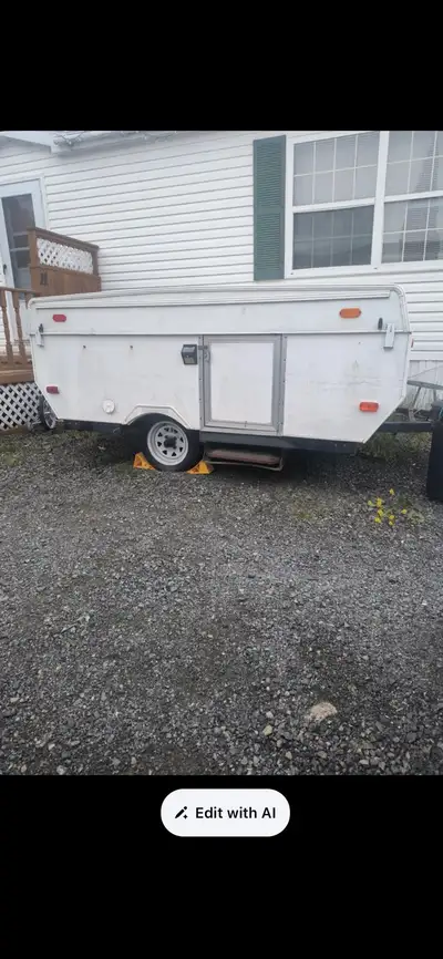 1999 coachman 8ft tent trailer, 3 beds, stays nice and dry no tares in canapys new laminate flooring...