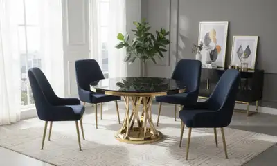 Elevate your dining space with this sophisticated round dining table, perfect for gatherings and eve...