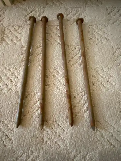 Set of 4 vintage iron pegs, View more