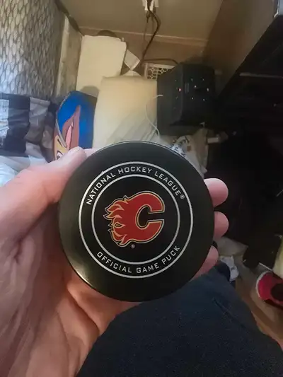 Game used hockey puck, View more