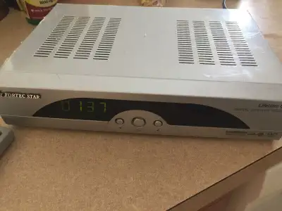 Fortec Star Lifetime Ultra Digital FTA receiver in like new working condition with remote and owner'...