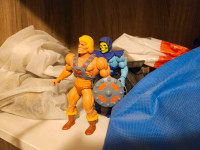 He-Man figures and vehicle 