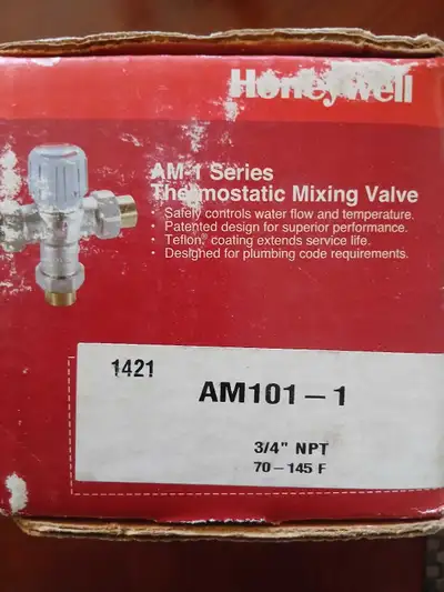 Honeywell AM101-1 thermostatic mixing valve designed to safely control water temperature and flow. S...
