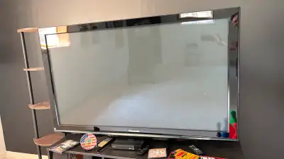 Panasonic plasma 58” tv with solid stand, View more