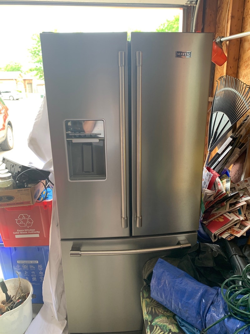 Maytag Stainless Steel Refrigerator w/ ice maker and water dispe