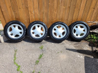 Ford mustang rims with 205 60 15 Goodyear winter tires. 