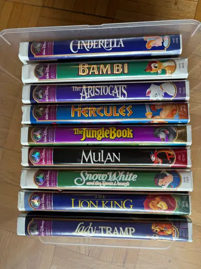 Relive the magic with this collection of Disney Masterpiece VHS tapes, featuring classics like Cinde...