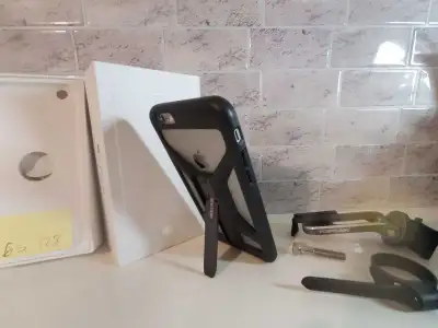 Apple iPhone 6s with a Topeak RideCase bike mount, View more
