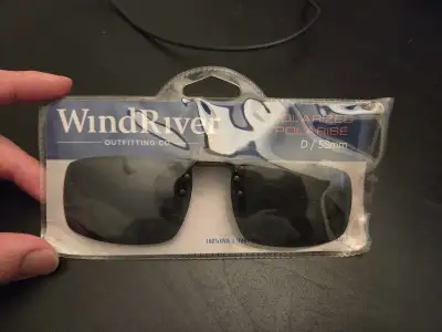 Get ready to upgrade your eyewear with these Wind River clip-on sunglasses, boasting polarized lense...