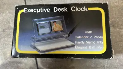 This new Pen Desk Set offers a calendar, photo display, memo tray, and an elegant ballpoint pen, all...