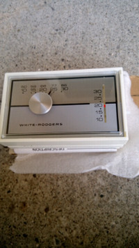 Heating cooling thermostat