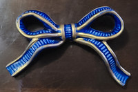 Vintage blue and gold porcelain bow tie ribbon
