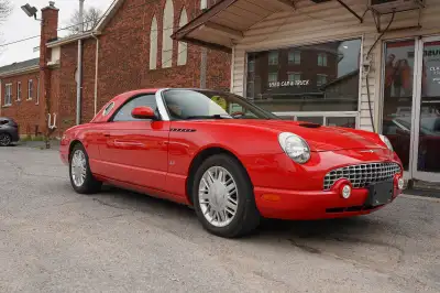 Extra tires and rims, caddy for hardtop are included. Premium condition. Clean Carfax.