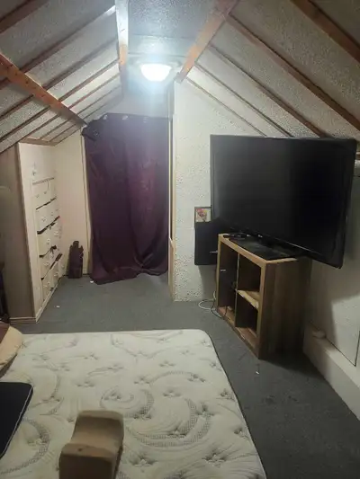 small furnished room for rent with shared kitchen and bathroom
