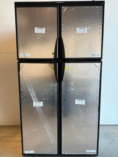 Dometic Rm1350sl fridge, propane/electric, 4 door, black trim, came out of a 2024 unit, will be show...