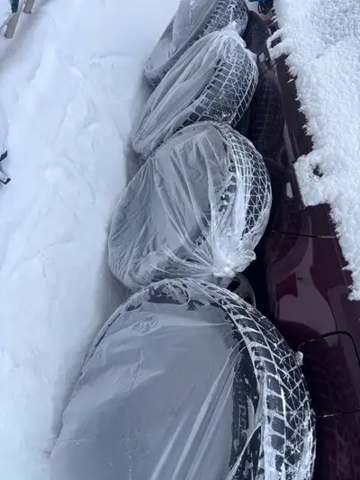 I am selling a Set of 4 Blizzard Winter Tires. 235/55/R20- directional Good condition Contact 780518...