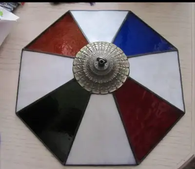 bar style Stained glass shade with Tiffany style center. Hand made shade. ,18 inches at widest point...