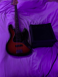  Bass electric guitar and speaker