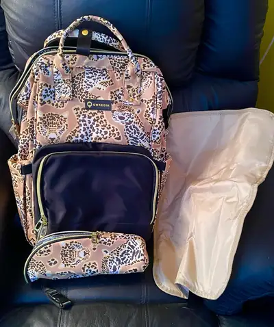 Brand new large capacity diaper bag backpack with many features including waterproof pockets, three...