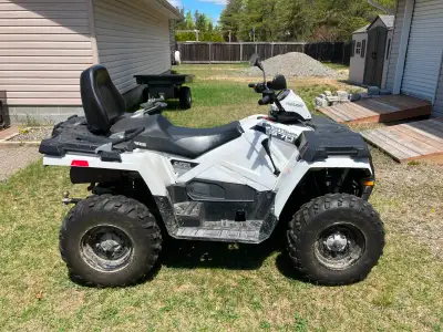 Only 3000 kms, 2 up factory seat. comes with a winch and a 5 foot polaris plow. Have a set of Camso...