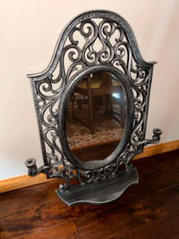 Antique mirror with shelf and candle holder