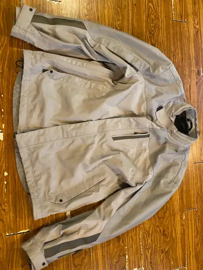Klim “Blade” ADV Jacket Lighwat Grey in Color, with dark Grey reflective striping. Waterproof Gore-T...