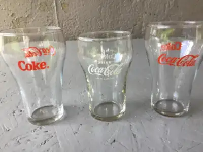 Not much to say here. I have three Coke glasses for sale. Two glasses have red lettering and the oth...