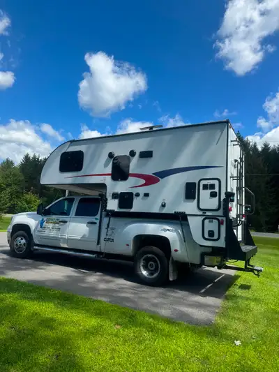Nice shape also use on my GMC 2500. Large frig, queen bed, tv /dvd/radio, bathroom w/shower/outside...