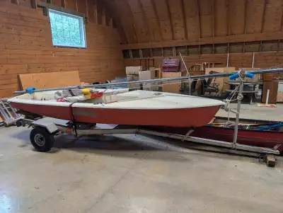 1500$ obo Minstral2 sailboat with auto bailer. New trailer included. Dolley included. All sails and...