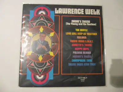 Up for sale is a near mint like new copy of Lawrence Welks orchestral reproduction of Nadias Theme (...