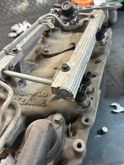 Tpi intake off a 1990 z28. Lower intake is edelbrock, upper is stock
