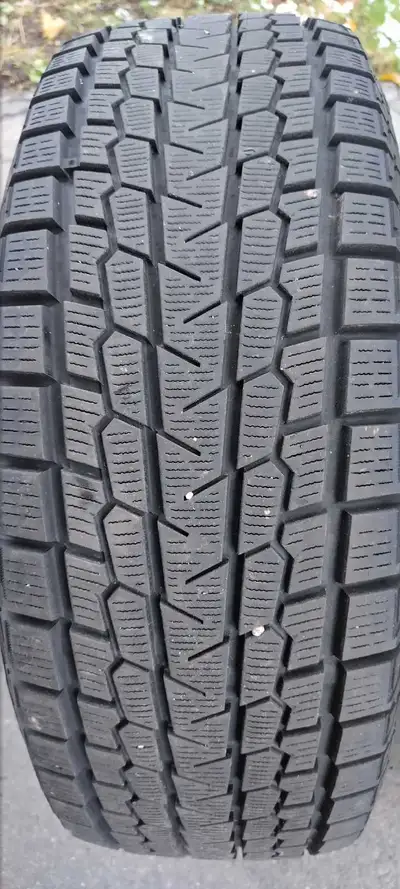 Excellent condition Yokohama Ice Guard GO75 winter tires. Full set of four winter tires with 235/65R...