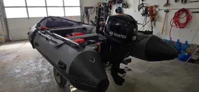 Stryker inflatable 420HD with Tohatsu 30hp electric start, boats gas aluminum floor and heavy duty b...