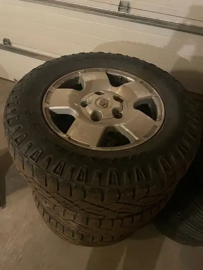 Rims and tires off a 2010 Tundra. 5 x 150 bolt pattern. Rims in decent condition but the tires are w...