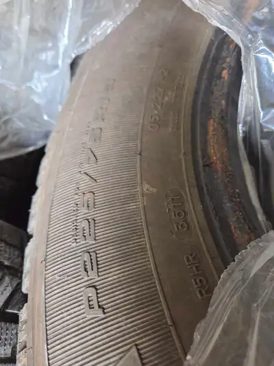 4 studded winter tires 95% tread.